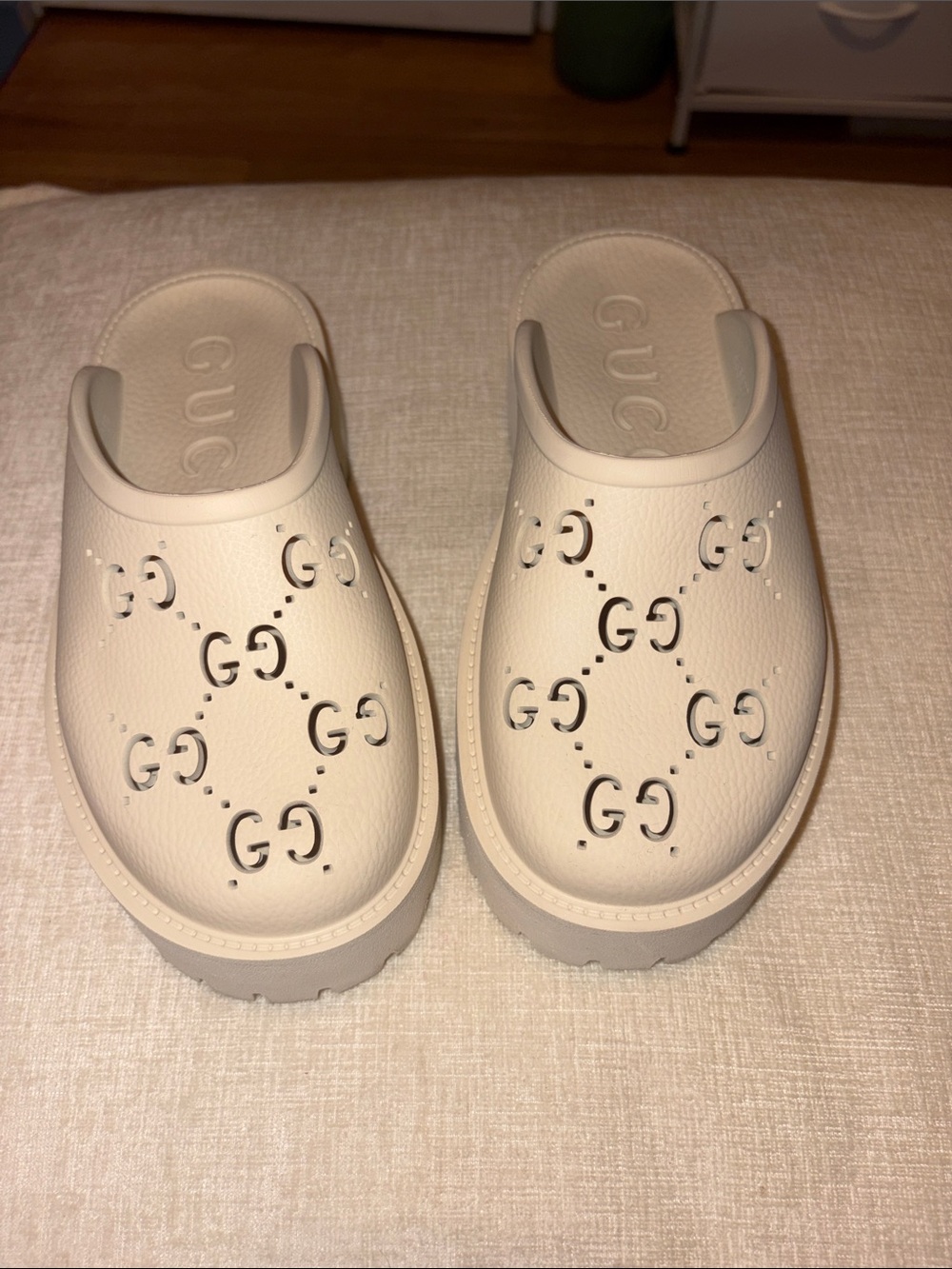 GUCCI Rubber Monogram GG Go Through Platform Slide Clogs in mystic white.